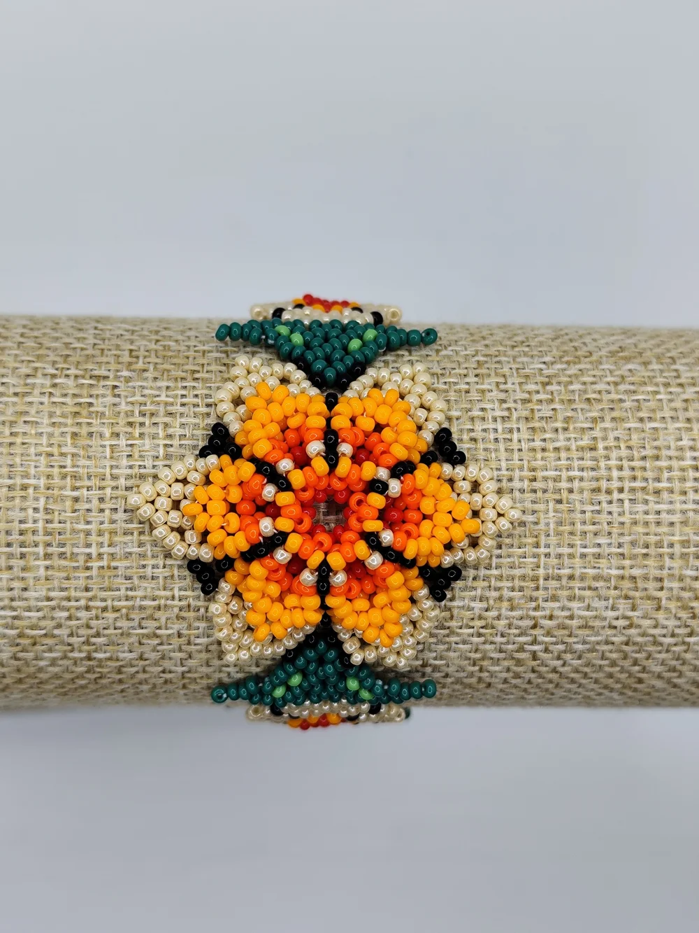 Vibrant Orange Floral Seed Bead Bracelet with Gold & Green Accents